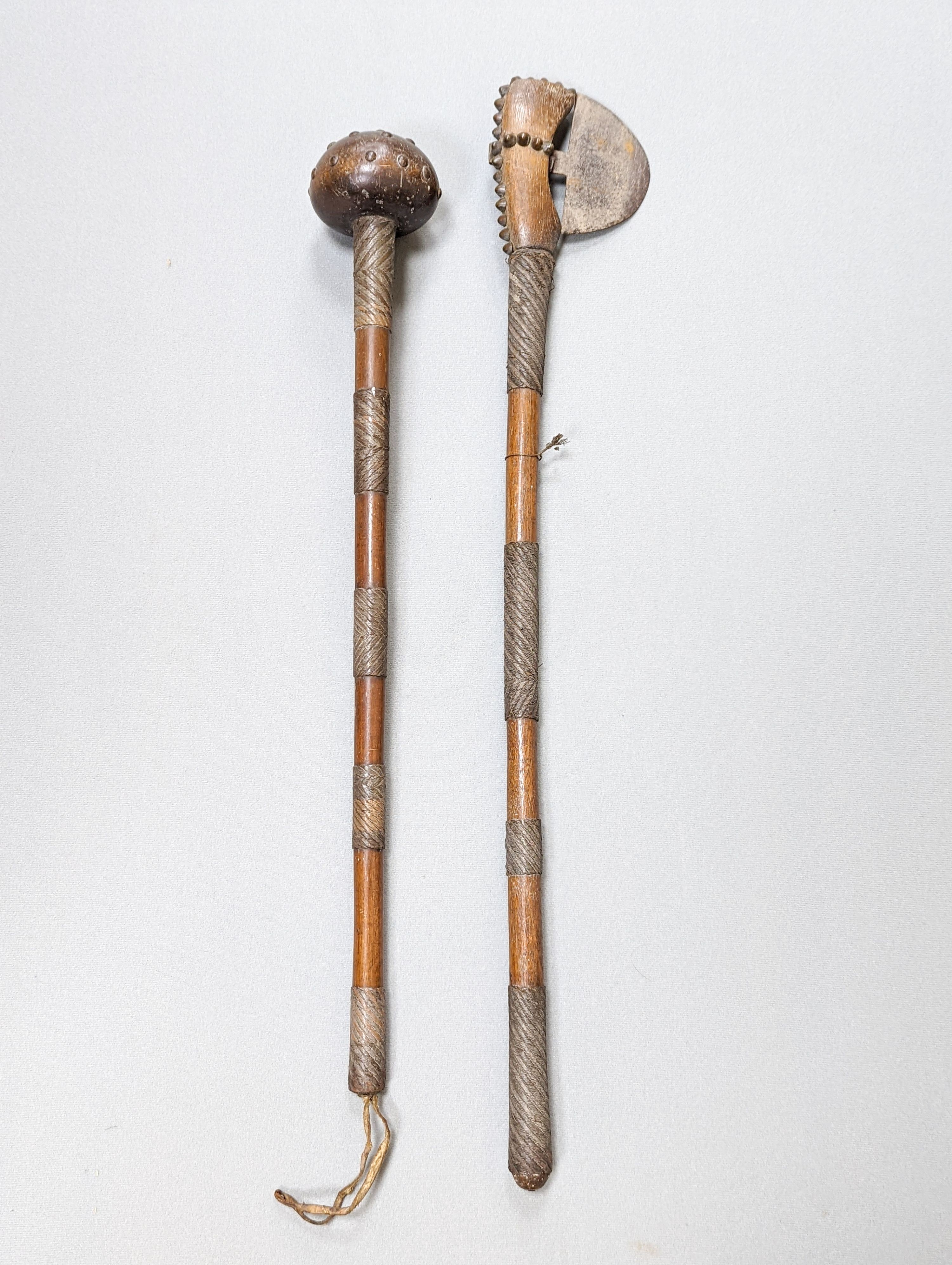 A Zulu hardwood, braided wire and studded knobkerrie and a similar axe 79cm